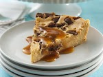 Impossibly Easy Toffee Bar Cheesecake was pinched from <a href="http://www.bettycrocker.com/recipes/impossibly-easy-toffee-bar-cheesecake/e586f09d-6cc2-4579-8cb0-630deea0cb49" target="_blank">www.bettycrocker.com.</a>
