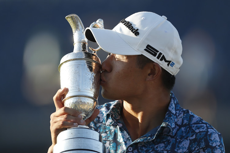 Collin Morikawa of United States kisses the Claret Jug after winning The 149th Open at Royal St George’s Golf Club in Sandwich on July 18, 2021.