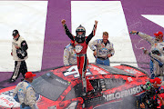 Kevin Harvick celebrates after winning the NASCAR Cup Series FireKeepers Casino 400 at Michigan International Speedway on August 7 2022 in Brooklyn, Michigan.