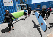 It takes Annelissa Mhloli 20 minutes to get into her wetsuit, she says. Then she's ready to lead her young charges from Khayelitsha into the sea at Muizenberg to discover the joy of surfing.