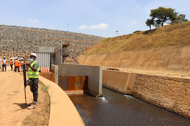 An outlet that will release water from the dam back to Thiba river