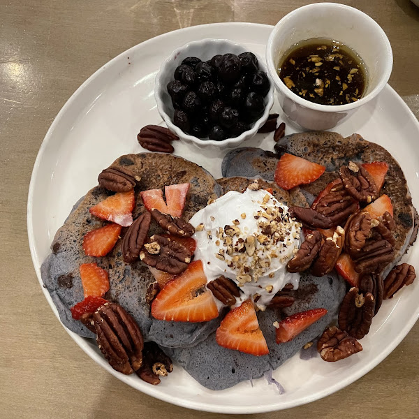 GF Purple yam pancakes with ginger syrup and pecans. Sooo good!