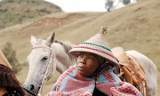 Mmabatho Mogomotsi plays a no-nonsense boss of a cattle raiding gang in Outlaws. 