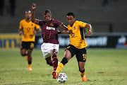 Oshwin Andries of Stellenbosch challenges Nkosingiphile Ngcobo of Kaizer Chiefs during their DStv Premiership match at Danie Craven Stadium in Stellenbosch. 