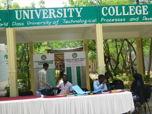 Garissa University College clerks register new privately sponsored students yesterday. The college re-opened on Monday after nine of months of closure.