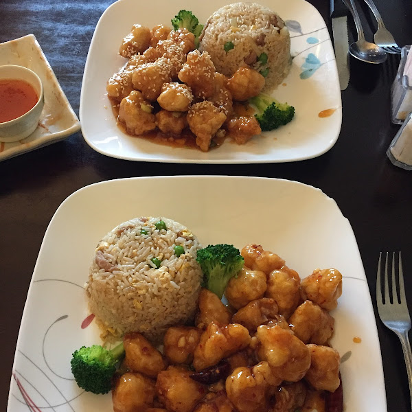 Top is sesame chicken with pork fried rice. Bottom is general tso’s chicken with pork fried rice.
