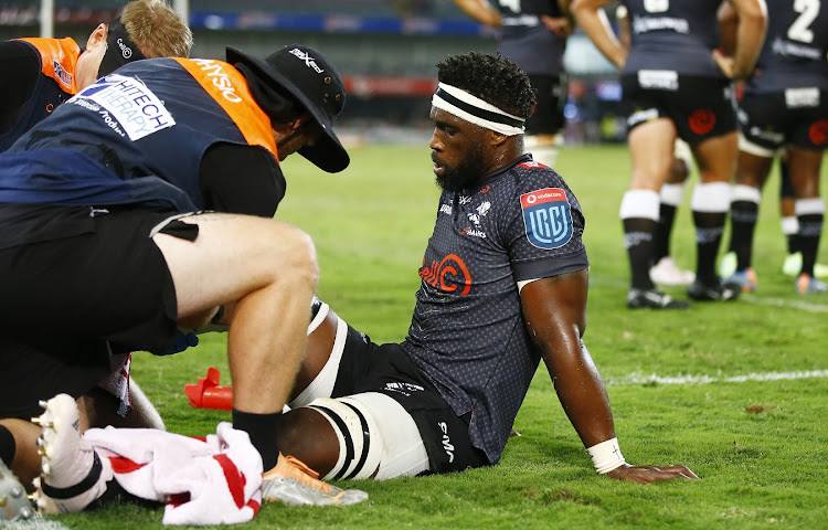 Siya Kolisi is treated for an injury in the Sharks' United Rugby Championship match against Munster at Kings Park in Durban on April 22 2023.