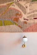 The geological tapestry of the Melville Koppies was produced with Karoo Looms.