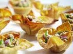 Crispy Wonton Cups with Tuna Salad was pinched from <a href="http://www.foodnetwork.com/recipes/sandra-lee/crispy-wonton-cups-with-tuna-salad-recipe/index.html?soc=sharingfb" target="_blank">www.foodnetwork.com.</a>