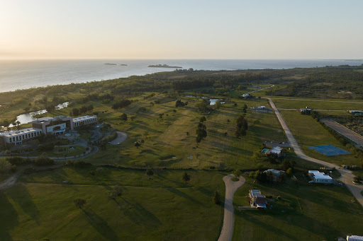 Modern building seaside, golf course and greenery - Luxury land for sale in Colonia del Sacramento