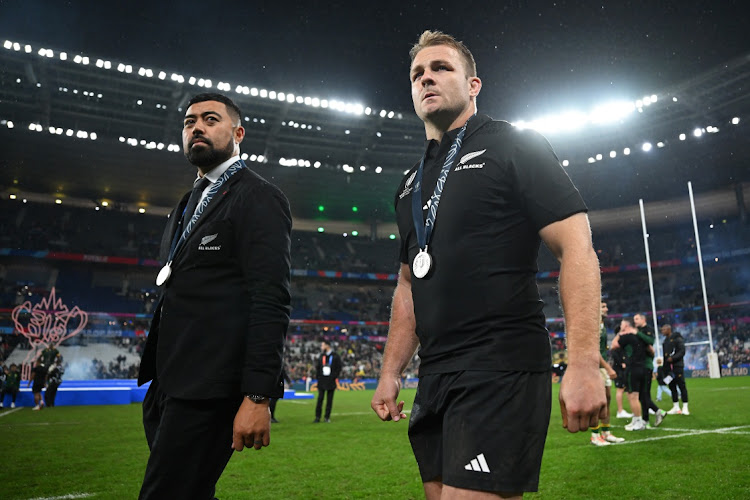 All Blacks captain Sam Cane looks dejected with his runners-up medal after the team's defeat in the 2023 Rugby World Cup final against the Springboks at Stade de France in Paris on Saturday night.