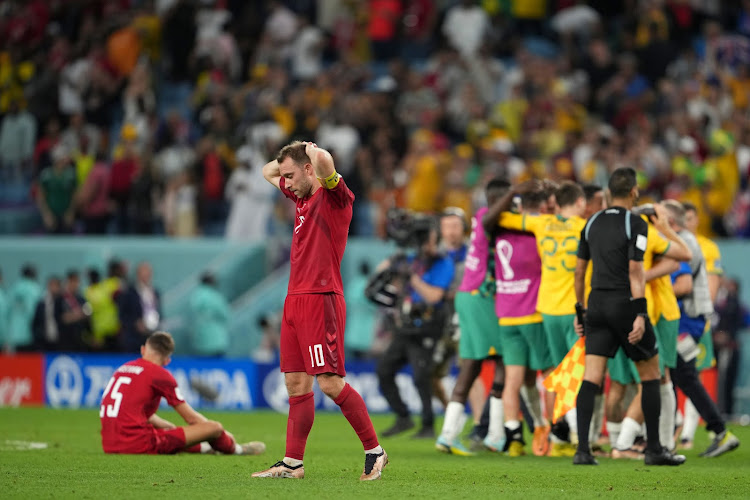 Christian Eriksen (2nd L) of Denmark looks depressed after the Group D match between Australia and Denmark at the 2022 FIFA World Cup at Al Janoub Stadium in Al Wakrah, Qatar, Nov. 30, 2022.