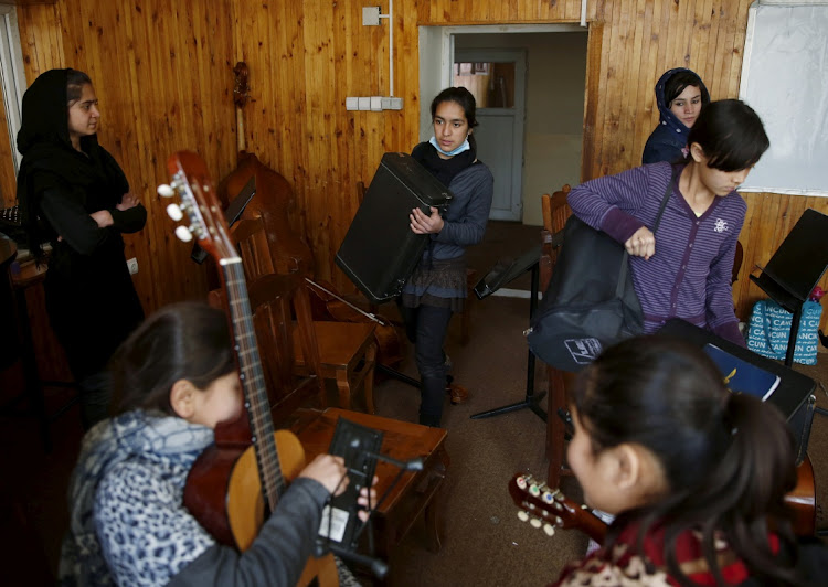 Members of the Zohra orchestra, an ensemble of 35 women, practises during a session, at Afghanistan’s National Institute of Music, in Kabul, Afghanistan, in this photo taken on April 4 2016. Picture: REUTERS/AHMAD MASOOD