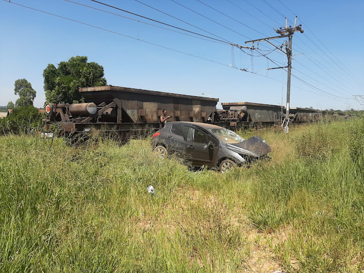 A car was hit by a train in Witbank on Tuesday morning, injuring three people.