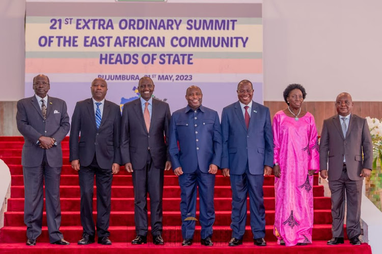 President William Ruto (third left) and Burundi's Evariste Ndayishimiye with other EAC heads representative during the 21st extraordinary summit in Burundi on May 31, 2023.