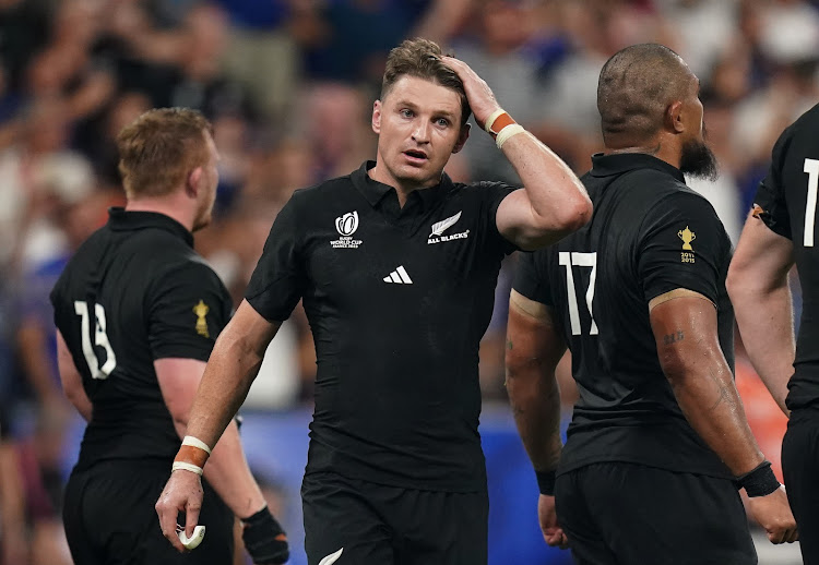 New Zealand's Beauden Barrett and team-mates looking dejected during the 2023 Rugby World Cup opening match against France.