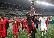 Dan Malesela has four more matches to win to lift his second Nedbank Cup trophy and one of the teams standing in his way is Orlando Pirates.
