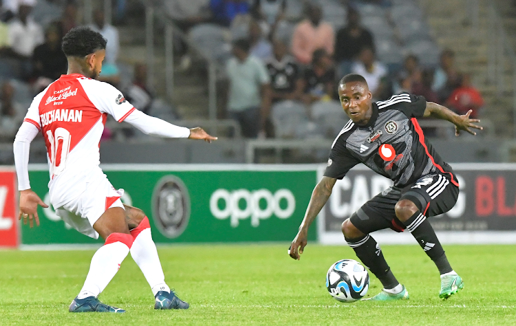 Orlando Pirates player Thembinkosi Lorch (right) and Keagan Buchanan of Cape Town Spurs during the Carling Knockout match at Orlando Stadium on October 20 2023.