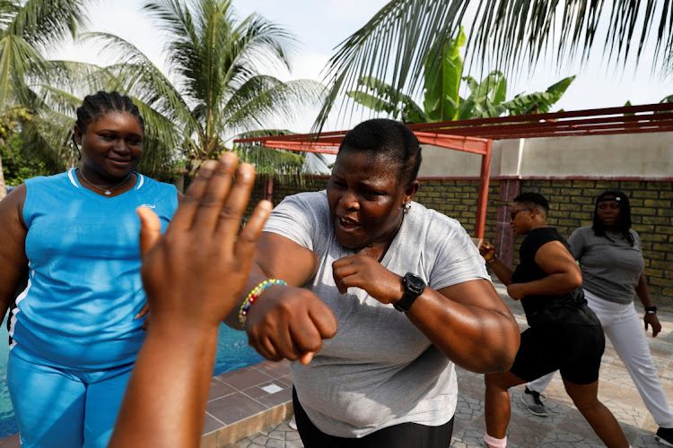 Nsikan Ekandem, Tolulope Ukpanah, 39, Margaret Thomas and Samantha Joseph, 27, members of the female-only security team Dragon Squad Limited, train during an exercise session at Camp Gee Hotel in Uyo, Akwa Ibom, Nigeria, November 18, 2022.