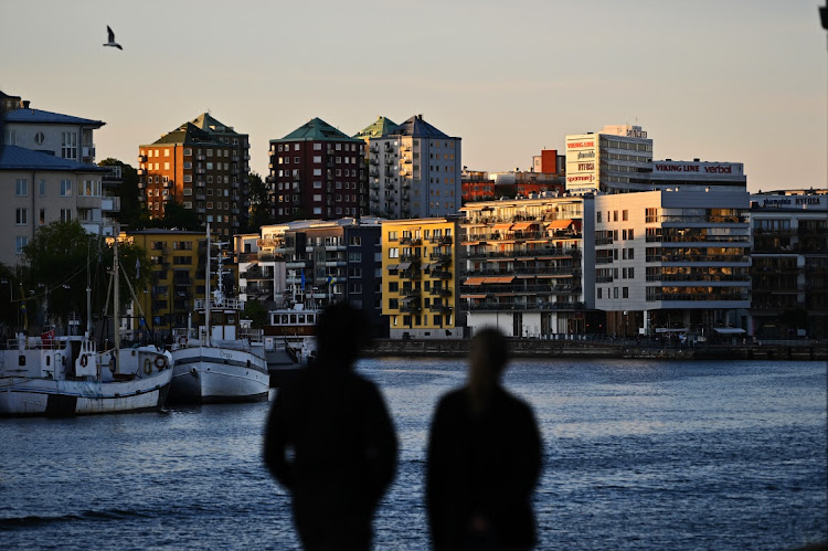 Evening sunlight illuminates residential apartment buildings on the Sickla Kanal in the Hammarby Sjostad district in Stockholm, Sweden, on Tuesday, June 1 2021. Picture: BLOOMBERG/MIKAEL SJOBERG