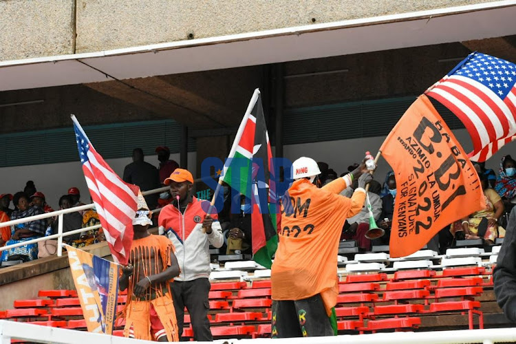 ODM supporters sing at Kasarani Stadium ahead of the Azimio La Umoja launch by ODM leader Raila Odinga on December 10, 2021.