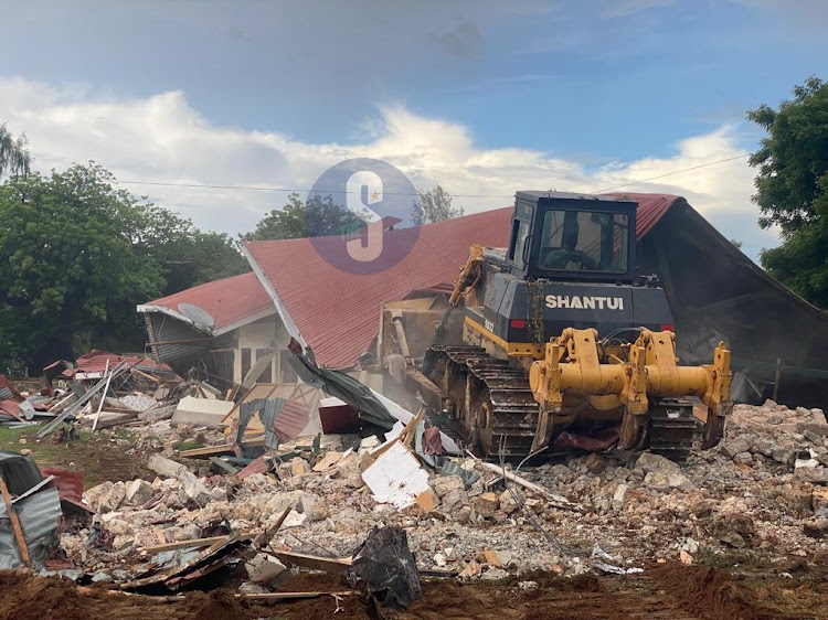 Kilifi county government officers enforcing demolitions of houses built on government land earmarked for the construction of the Sh 500 million county headquarters on April 4, 2024