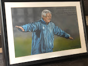 Legendary former Bafana Bafana coach Clive Barker in his signature flying pose captured in a frame at his home. His family were visited by a delegation of sporting officials on Monday.