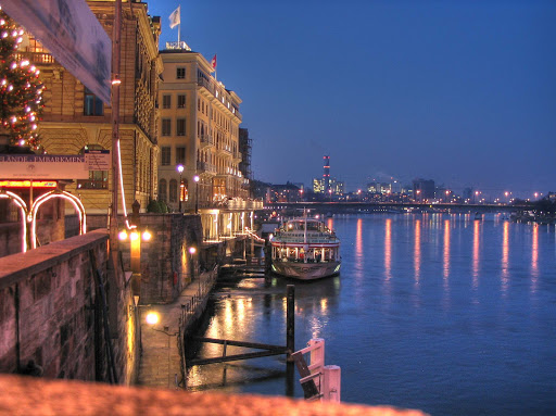 Basel-waterfront - The waterfront in Basel, Switzerland, as night falls. 