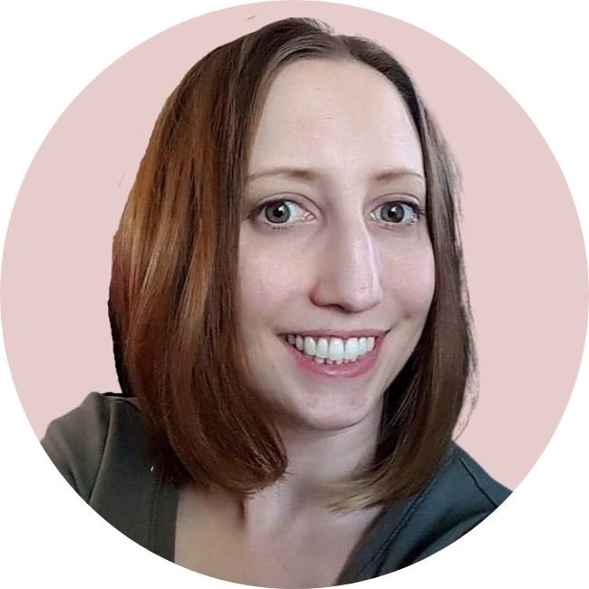 Picture of Lady with Brown Hair smiling with pink background