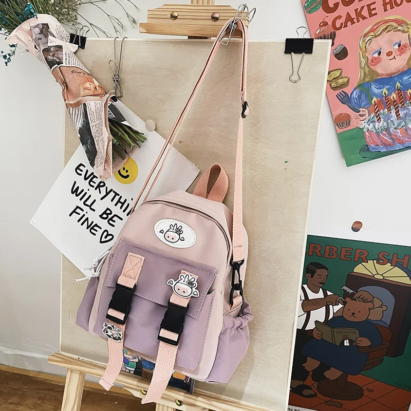 Women's Cute Multifunctional Colorblock Backpack Messenger Bag. Stylish and practical, perfect for carrying everything y