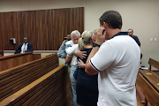 The family of Steven Preston, a cyclist who was knocked over and killed by a BMW driver in Fourways, Johannesburg, hug each other in court after the magistrate handed down the sentence. 