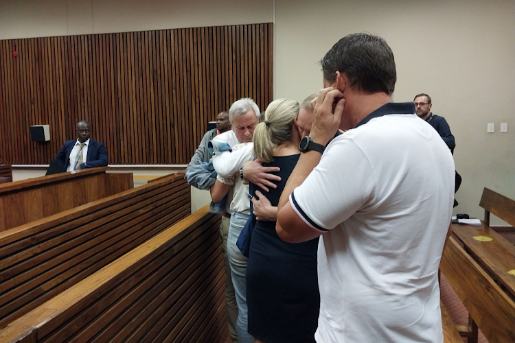 The family of Steven Preston, a cyclist who was knocked over and killed by a BMW driver in Fourways, Johannesburg, hug each other in court after the magistrate handed down the sentence.