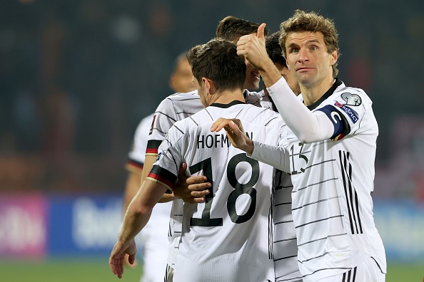 Germany's Thomas Müller (right) celebrates after his side's third goal, scored by İlkay Gündoğan during the 2022 World Cup qualifier against Armenia in Yerevan, Armenia.