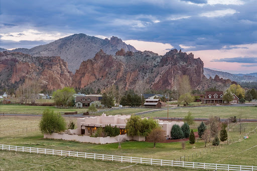 Luxury property for sale in Terrebonne (United States) - Pueblo style house with mountains background