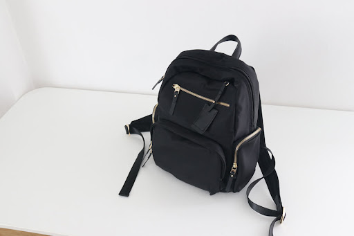 Title 16, Nylon cloth backpack with cowhide leather accen...