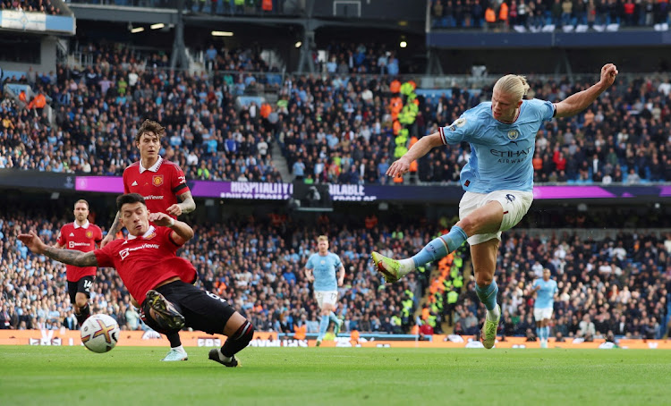 Manchester City's Erling Braut Haaland shoots at goal.