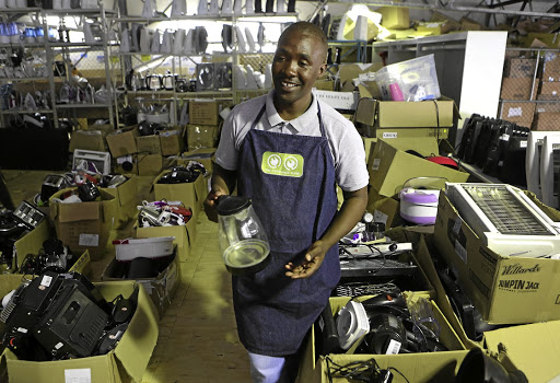SPIN CYCLE: Mthunzi Qagana specialises in fixing broken appliances Picture: Ruvan Boshoff