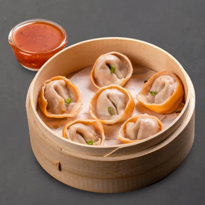 Steamed Schezwan Paneer Momo With Momo Chutney