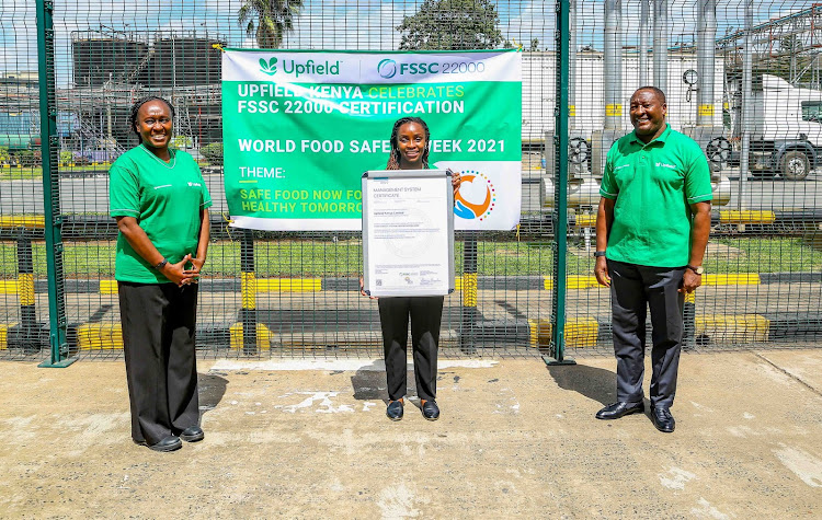 Upfield Kenya Head of Supply Chain Alice Majani, Upfield Kenya Head of Regulatory affairs and Nutrition Phyllis Obote and Managing Director Upfield Eastern and Southern Africa Peter Muchiri during an event to celebrate the FSCC certification at Upfield Nairobi Offices