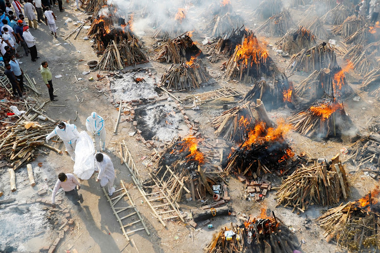 A general view of the mass cremation of those who died from the coronavirus disease (Covid-19) at a crematorium in New Delhi, India, April 26, 2021.