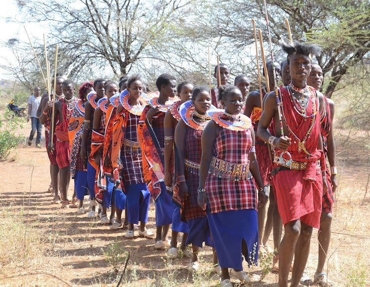 Morans boys and girls join in dance during the moran festival.