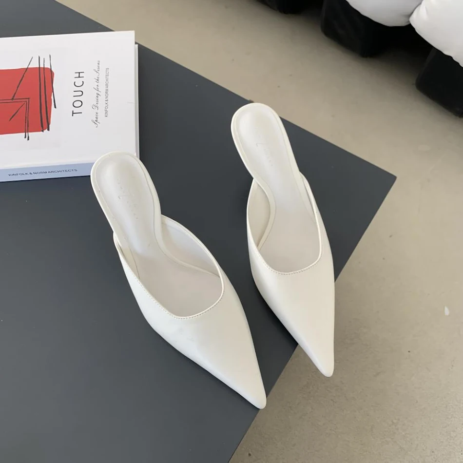Women's pointed stiletto heel slippers, European and American fashion, closed toe, for a stylish and elegant look.