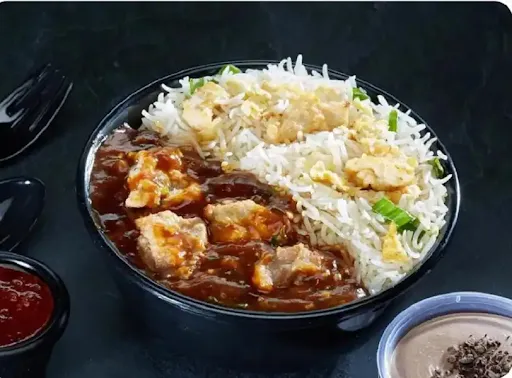 Chicken Burnt Garlic Rice With Manchurian Gravy