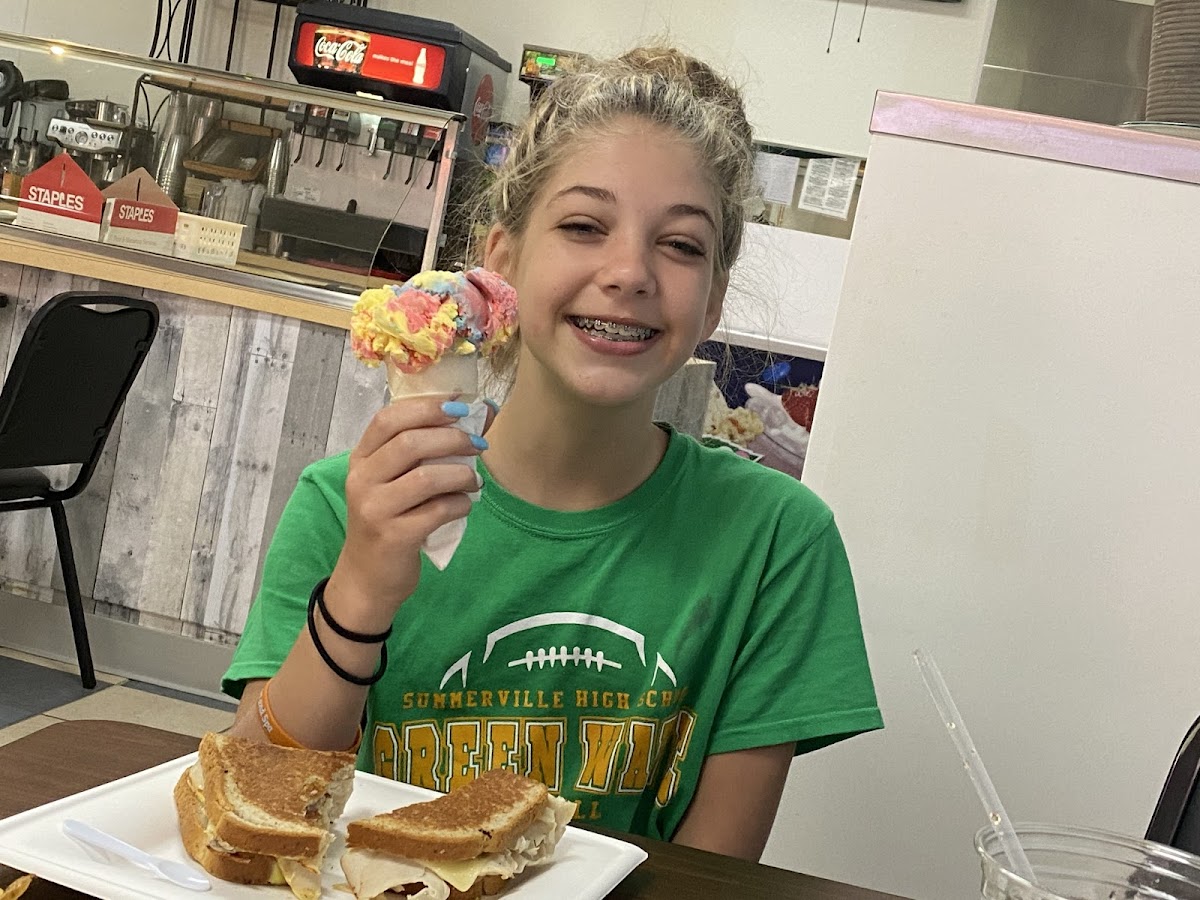 First ice cream cone in three years for my celiac girl. She says six stars!!