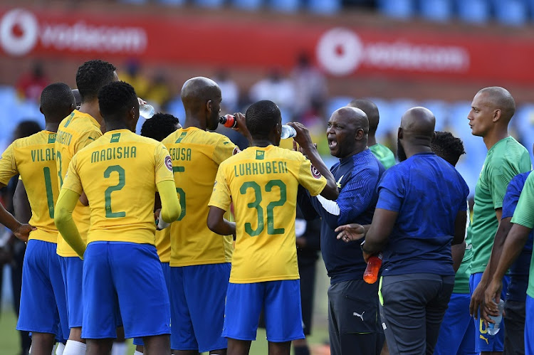 Mamelodi Sundowns coach Pitso Mosimane and his players during the Absa Premiership match between Chippa United at Loftus Versfeld Stadium on February 15, 2020 in Pretoria, South Africa.