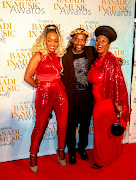 Ntombi Ngcobo Mzolo and her parents, Ihashi Elimhlophe and Linah Khama known as Ebony on the red carpet during the launch of the Basadi in Music awards held at Joburg theatre.