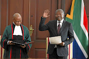 David Mabuza is sworn in as a member of parliament by Chief Justice Mogoeng Mogoeng at the presidential guesthouse in Pretoria yesterday. He is now legible to be appointed in any position after appearing  before the ANC integrity commission.  /Alaister Russell