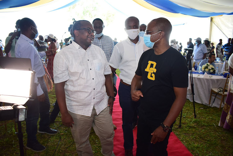 Housing PS Charles Hinga and Kilifi Governor Amason Kingi at the launch of the Awali Estate in Vipingo on Saturday.