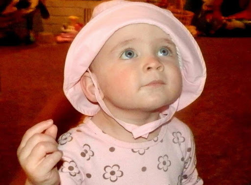 Stylin' in her new sun hat I got her...sooo cute.