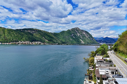 Peaceful lake at the foot of the mountains in this luxury house for sale in Bissone ($5,537,303)